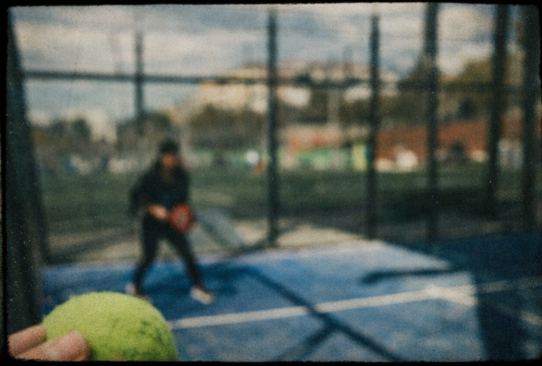 Padel players rotating partners in a bright court